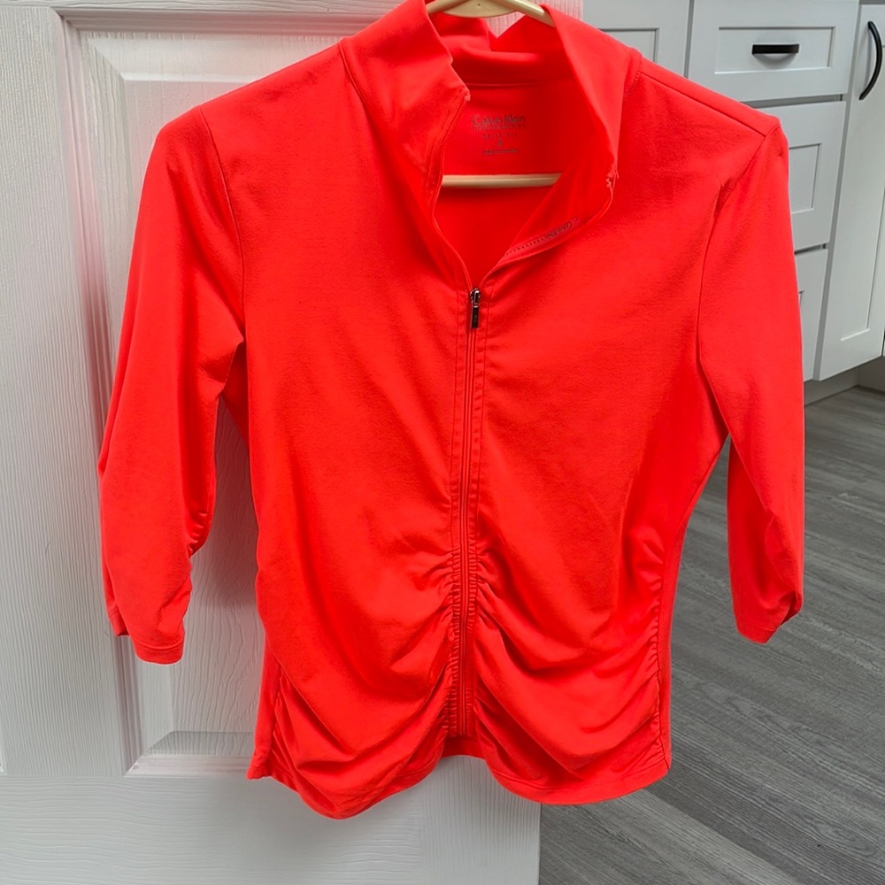 Calvin Klein orange zip up